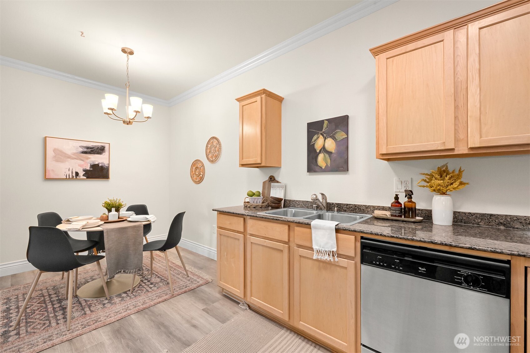 4579 El Dorado Way, Unit 107 Bellingham, WA 98226 - Photo 10 of 40 a kitchen with stainless steel appliances granite countertop a stove a sink and a microwave