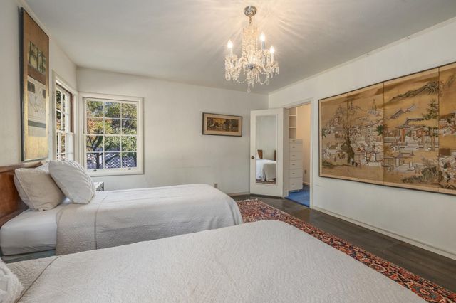 a bathroom with a shower toilet and sink
