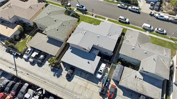 an aerial view of a house with wooden floor