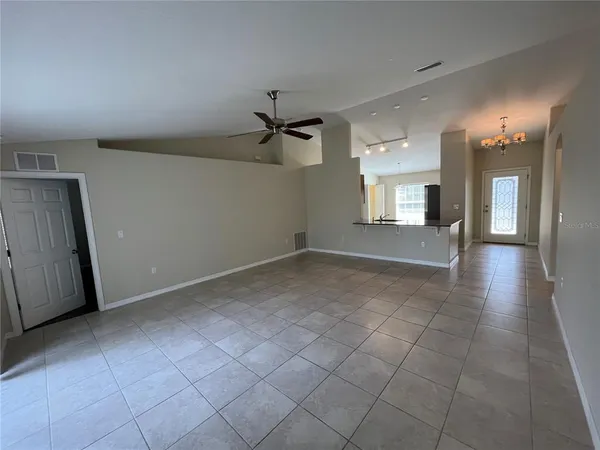 a view of a livingroom with a staircase