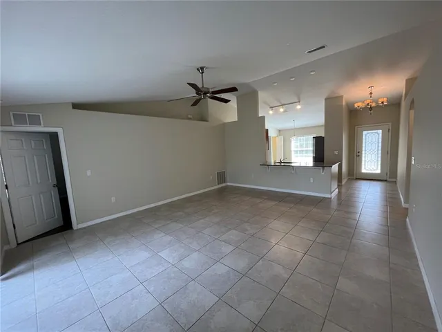 a view of a livingroom with a staircase