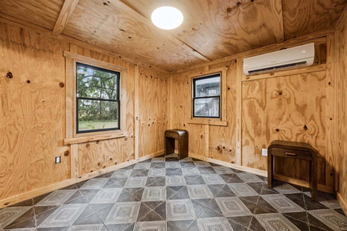 113 South 8th Street Fernandina Beach, FL 32034 - Photo 14 of 34 a view of a entryway door with a couch