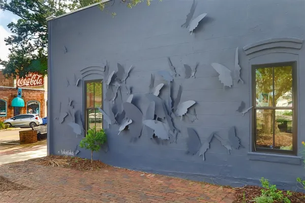 a view of entrance gate of a house