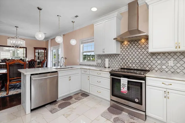 a kitchen with a sink and a large window