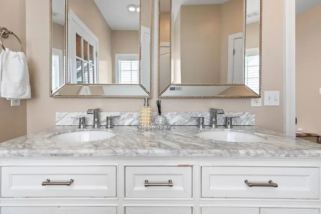 a view of a livingroom with an empty space and a window