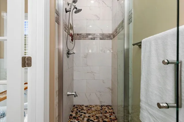 a bedroom with a bed and closet