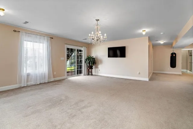 a bedroom with a bed and a table in it