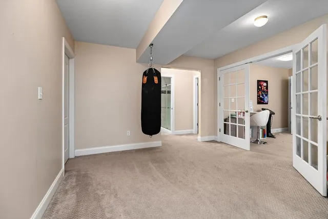 a view of a workspace with furniture and closet