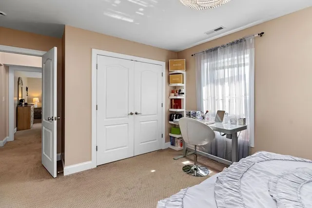 a view of a workspace with furniture