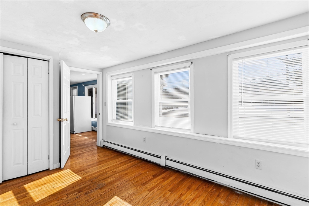 192 East Spring Street Avon, MA 02322 - Photo 17 of 25 a view of an empty room with a window