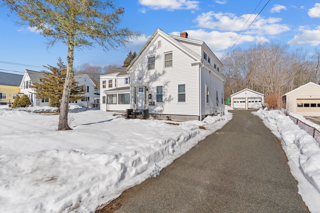 192 East Spring Street Avon, MA 02322 - Photo 2 of 25 a view of a building with a road