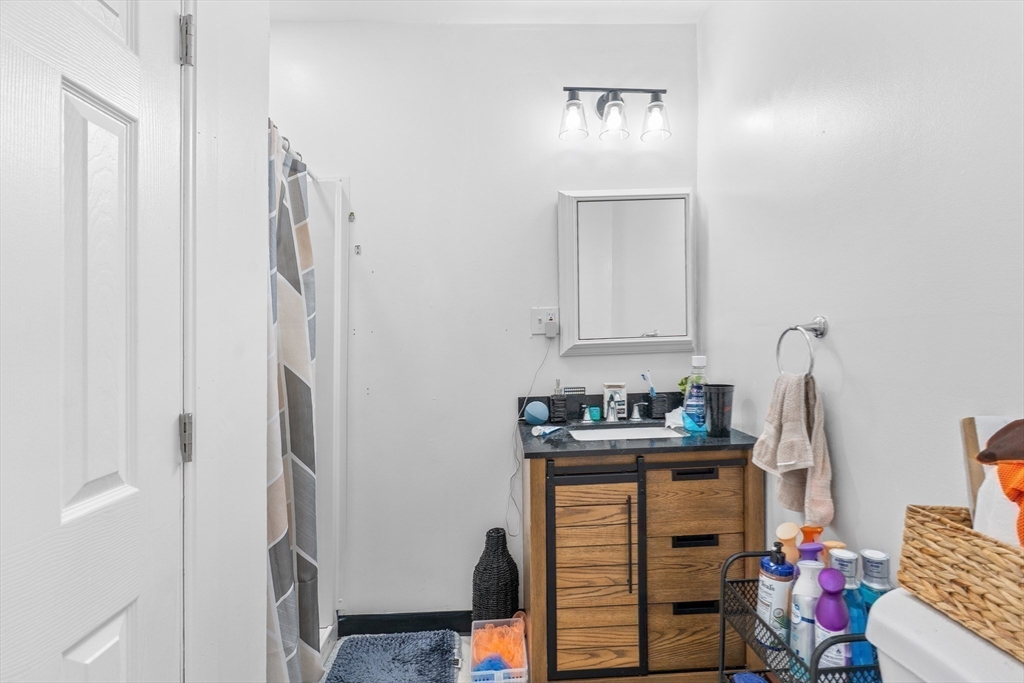 192 East Spring Street Avon, MA 02322 - Photo 22 of 25 a bathroom with a sink toilet and shower