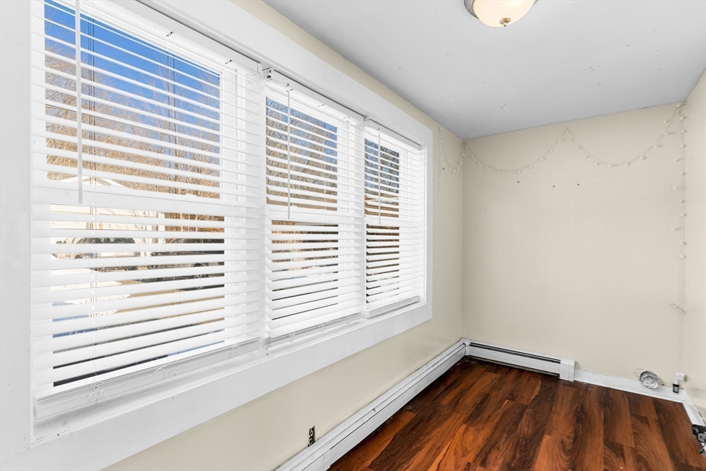 192 East Spring Street Avon, MA 02322 - Photo 23 of 25 a view of a room that has a window in it