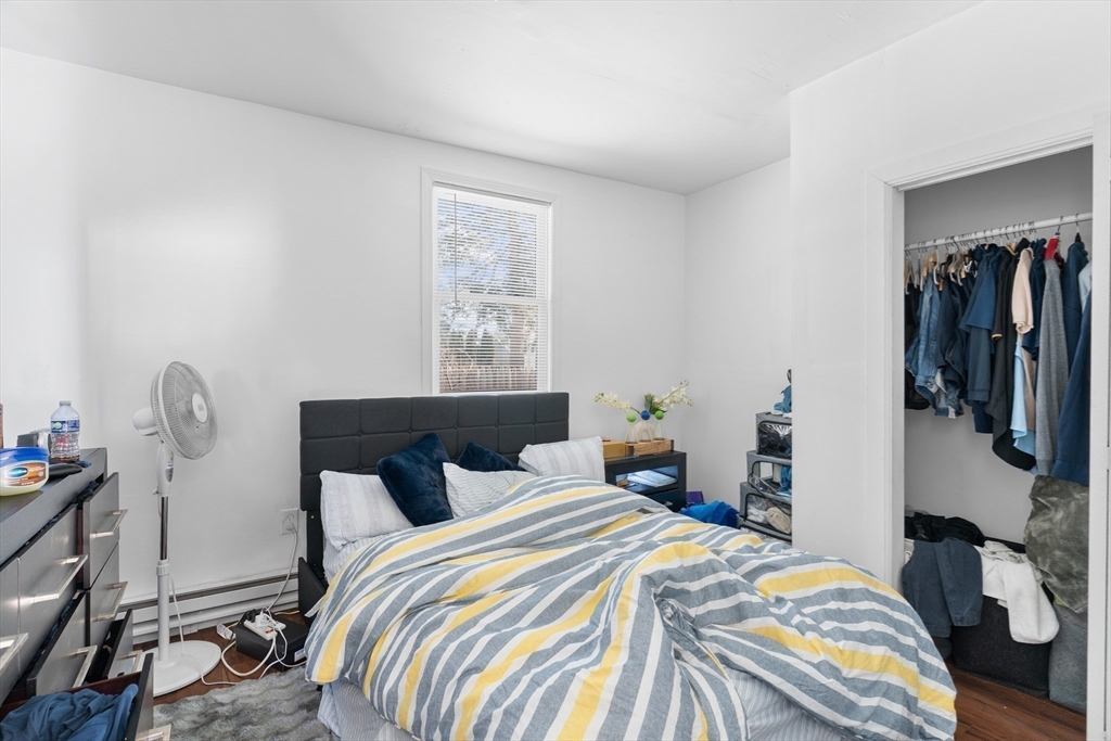 192 East Spring Street Avon, MA 02322 - Photo 24 of 25 a bedroom with a bed and a window