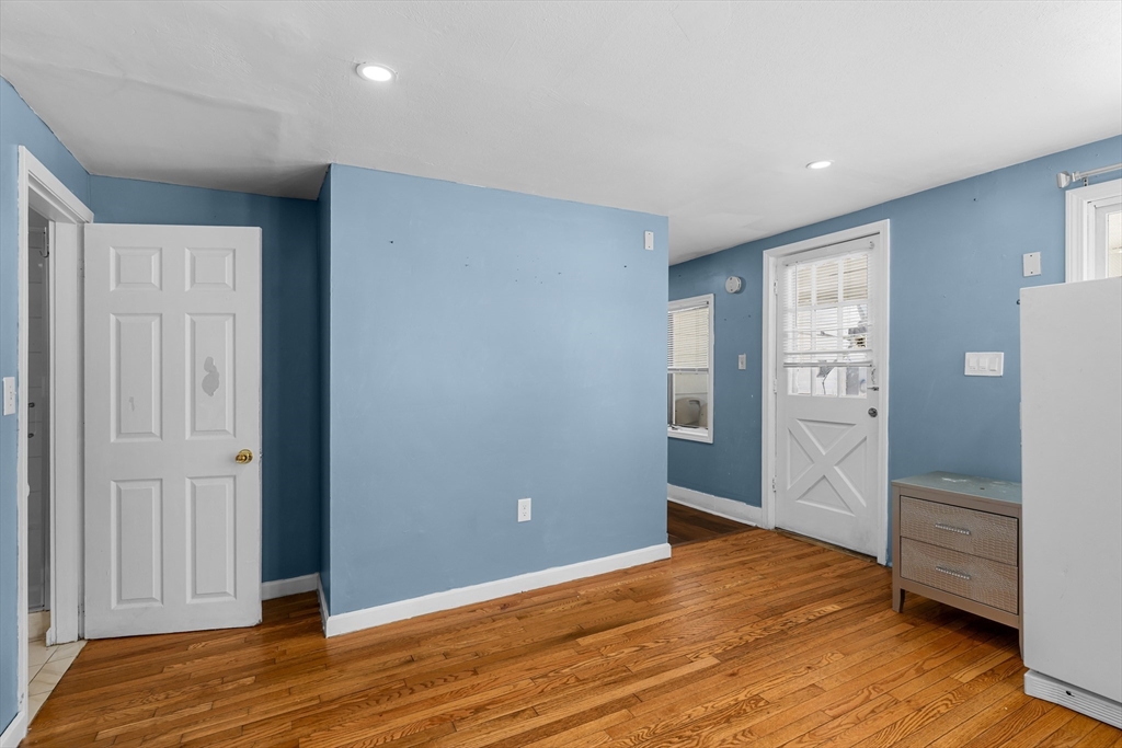 192 East Spring Street Avon, MA 02322 - Photo 7 of 25 a view of empty room with wooden floor