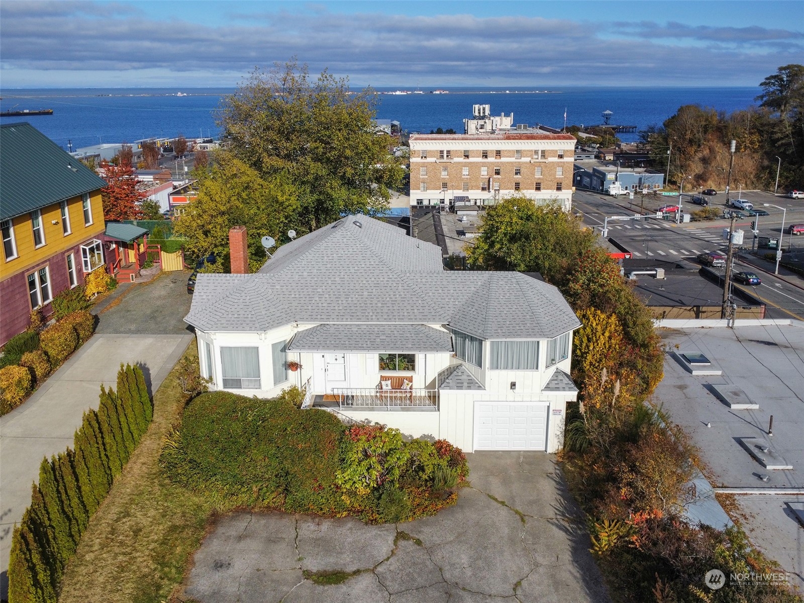 a aerial view of a house with a yard