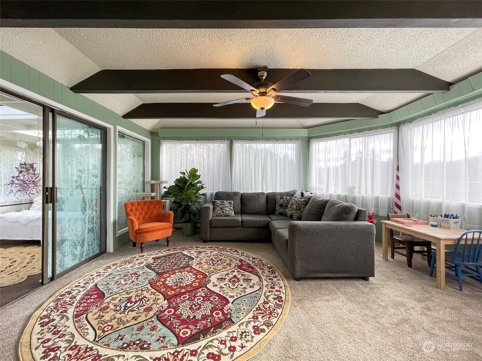 131 East 2nd Street Port Angeles, WA 98362 - Photo 11 of 33 a living room with furniture and a large window