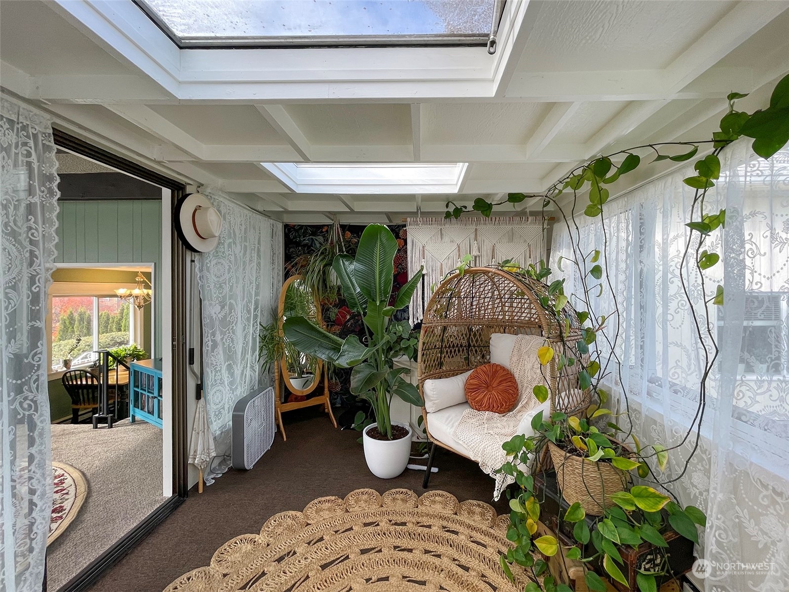 131 East 2nd Street Port Angeles, WA 98362 - Photo 16 of 33 a living room filled with furniture and a chandelier