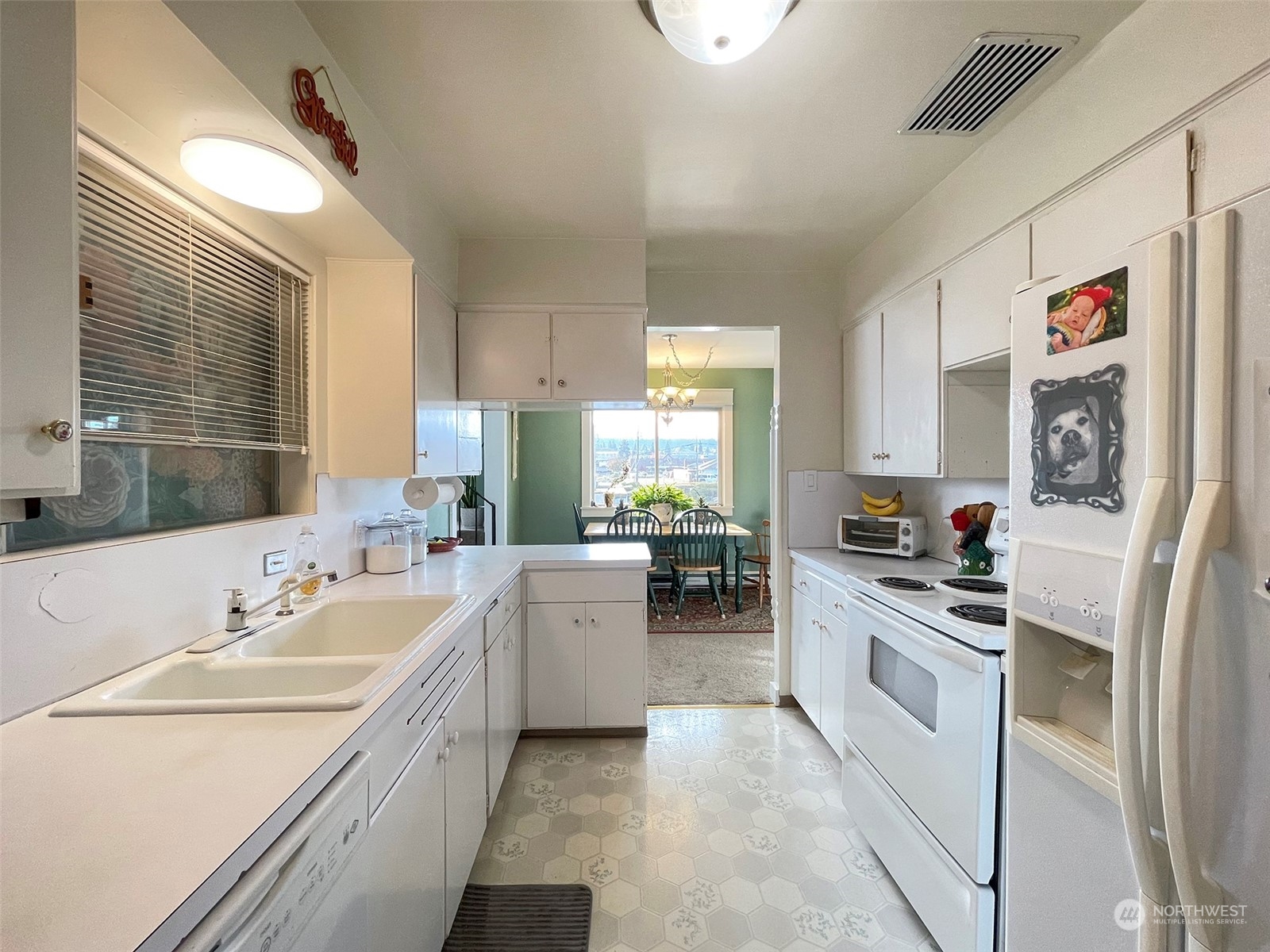 131 East 2nd Street Port Angeles, WA 98362 - Photo 18 of 33 a kitchen with a sink stove and refrigerator