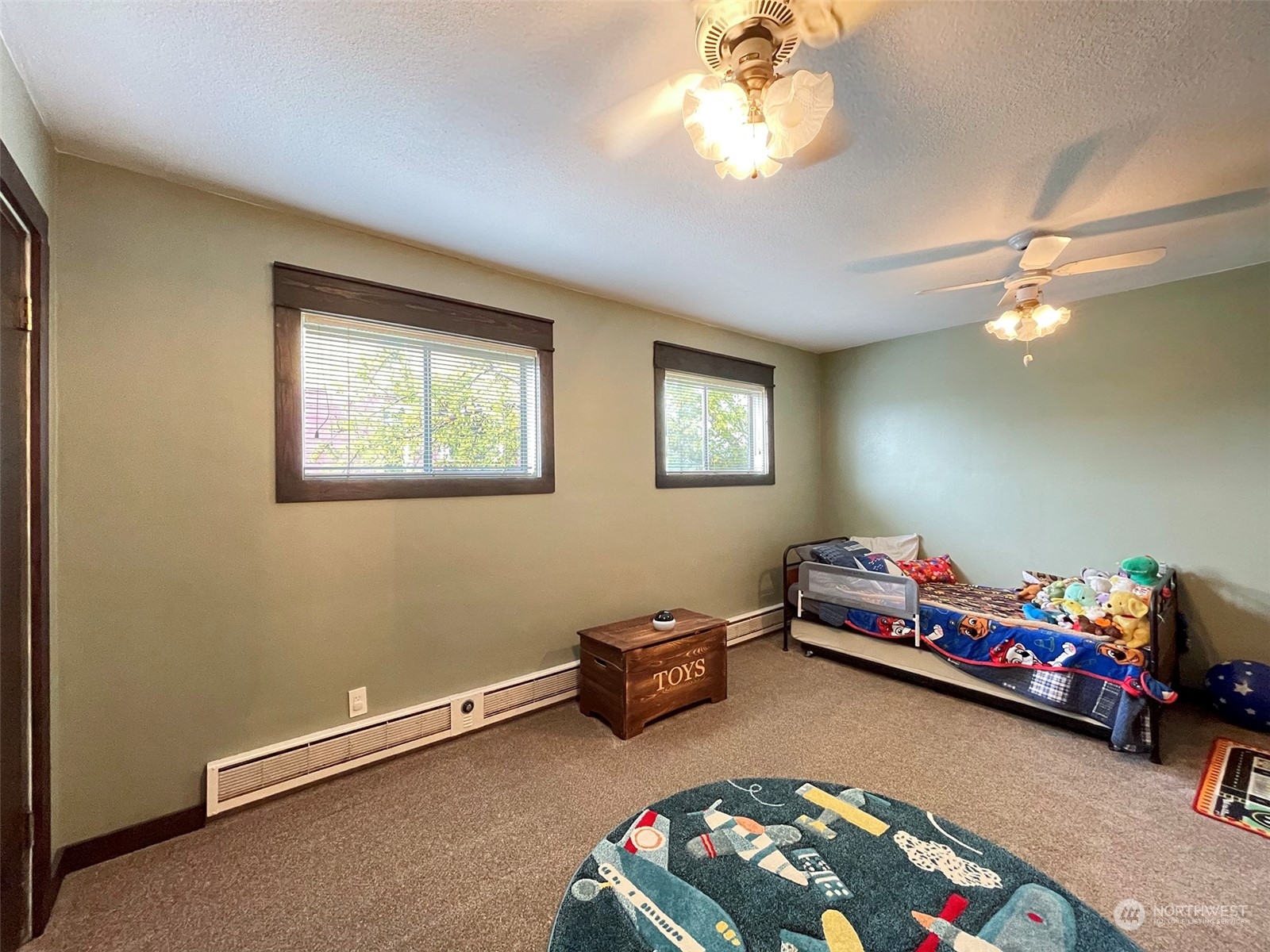 131 East 2nd Street Port Angeles, WA 98362 - Photo 21 of 33 a bedroom with bed and a window