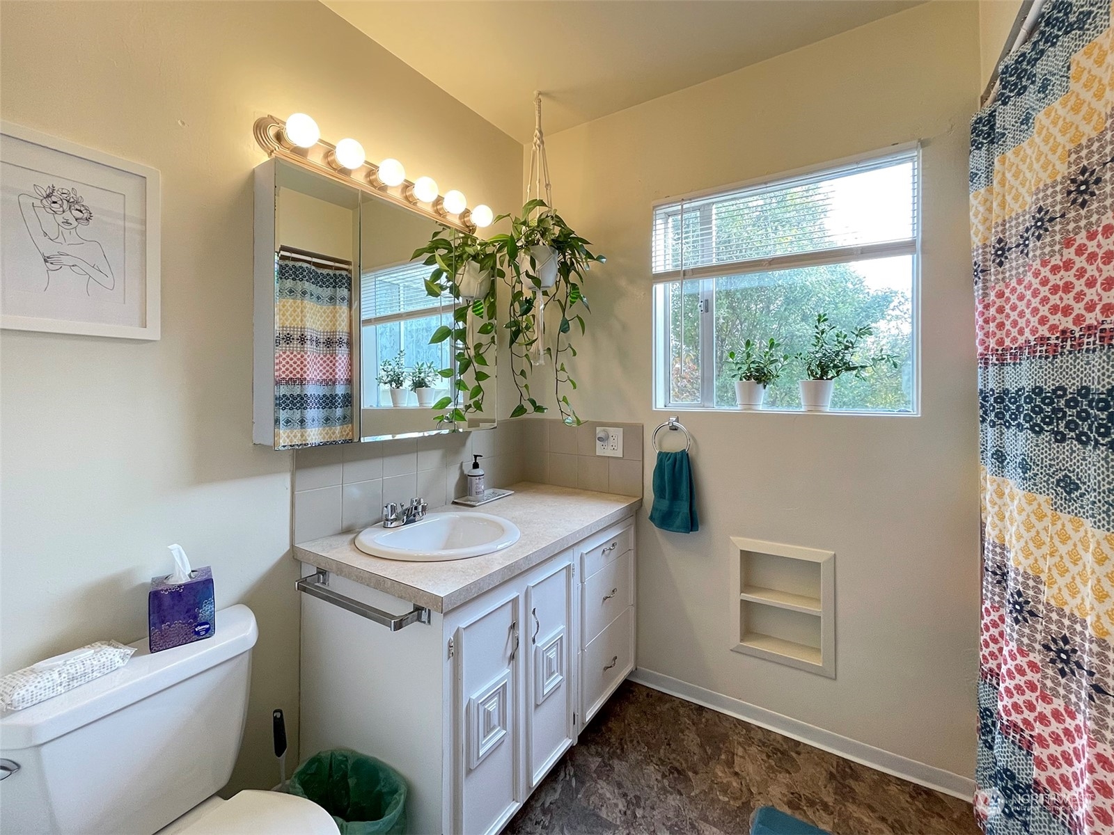 131 East 2nd Street Port Angeles, WA 98362 - Photo 22 of 33 a bathroom with a sink toilet and window