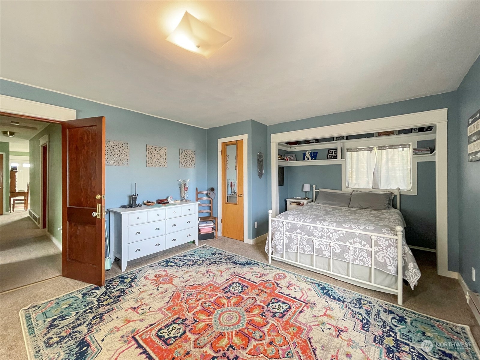 131 East 2nd Street Port Angeles, WA 98362 - Photo 23 of 33 a bedroom with a bed and a dresser