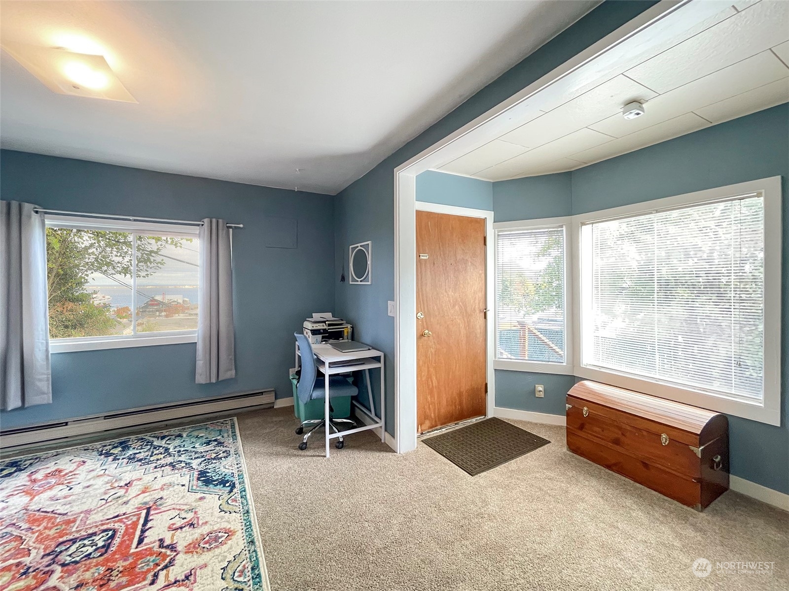 131 East 2nd Street Port Angeles, WA 98362 - Photo 25 of 33 a bedroom with furniture and a large window
