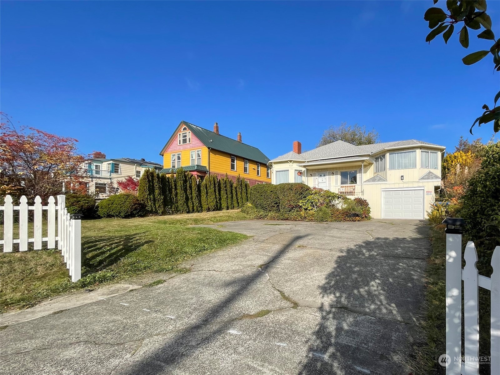 131 East 2nd Street Port Angeles, WA 98362 - Photo 32 of 33 a front view of a house with a yard and garage