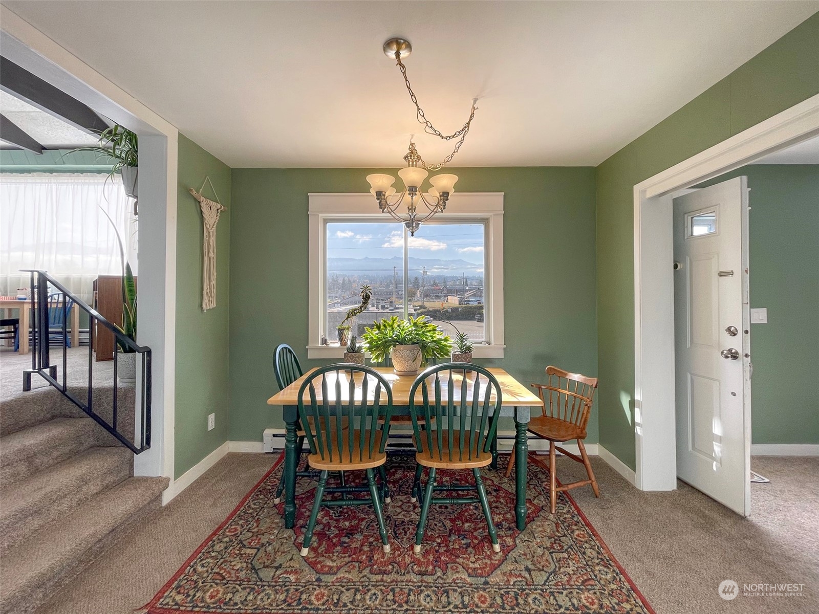 131 East 2nd Street Port Angeles, WA 98362 - Photo 10 of 33 a view of a dining room with furniture window and wooden floor