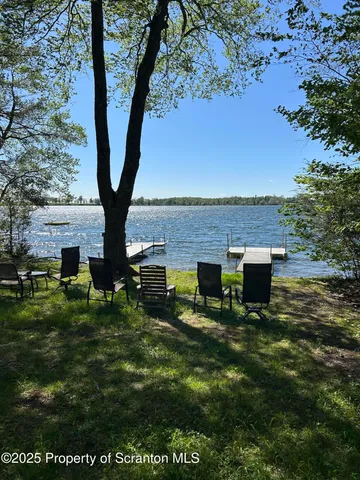 a room with furniture and a flat screen tv