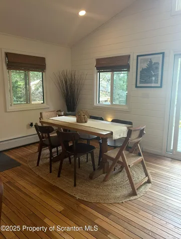 front view of a house with a trees