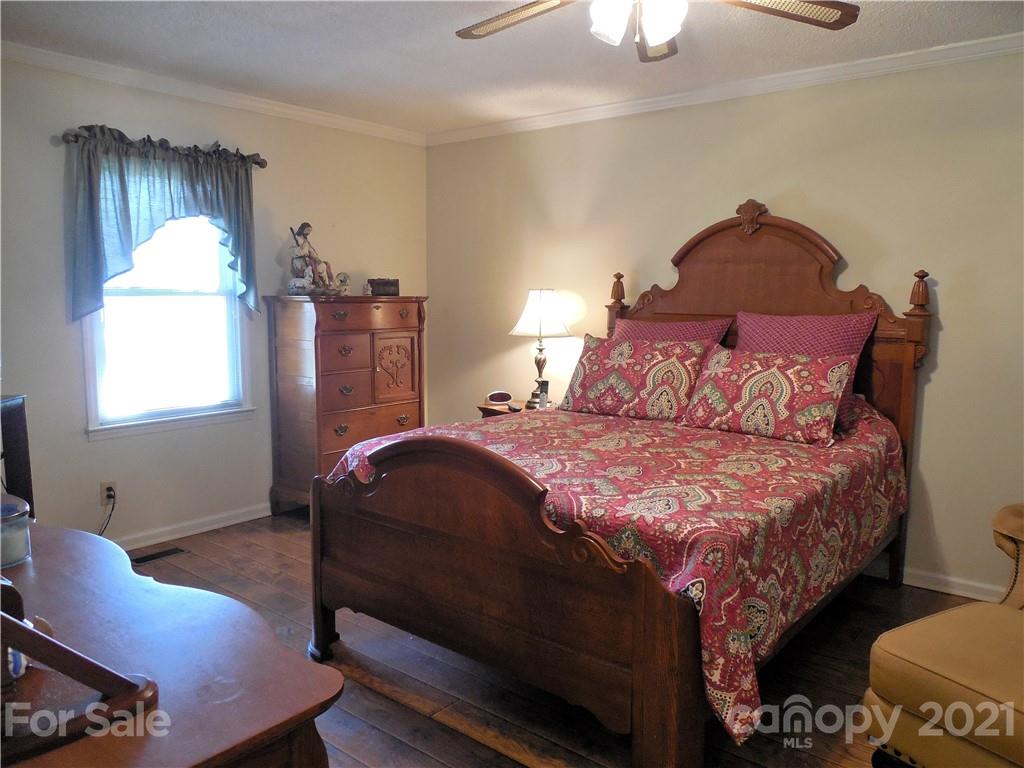 705 Washington Lane Kannapolis, NC 28083 - Photo 21 of 31 a bedroom with a bed and window