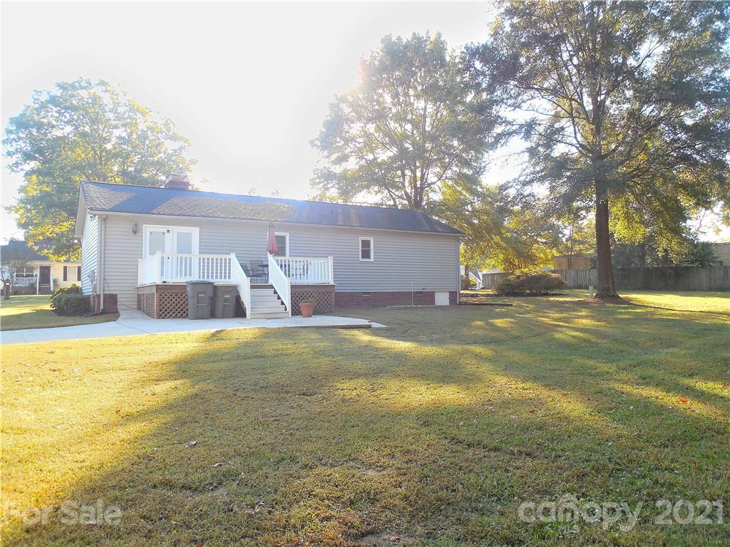 705 Washington Lane Kannapolis, NC 28083 - Photo 25 of 31 a view of a house with a yard and garage