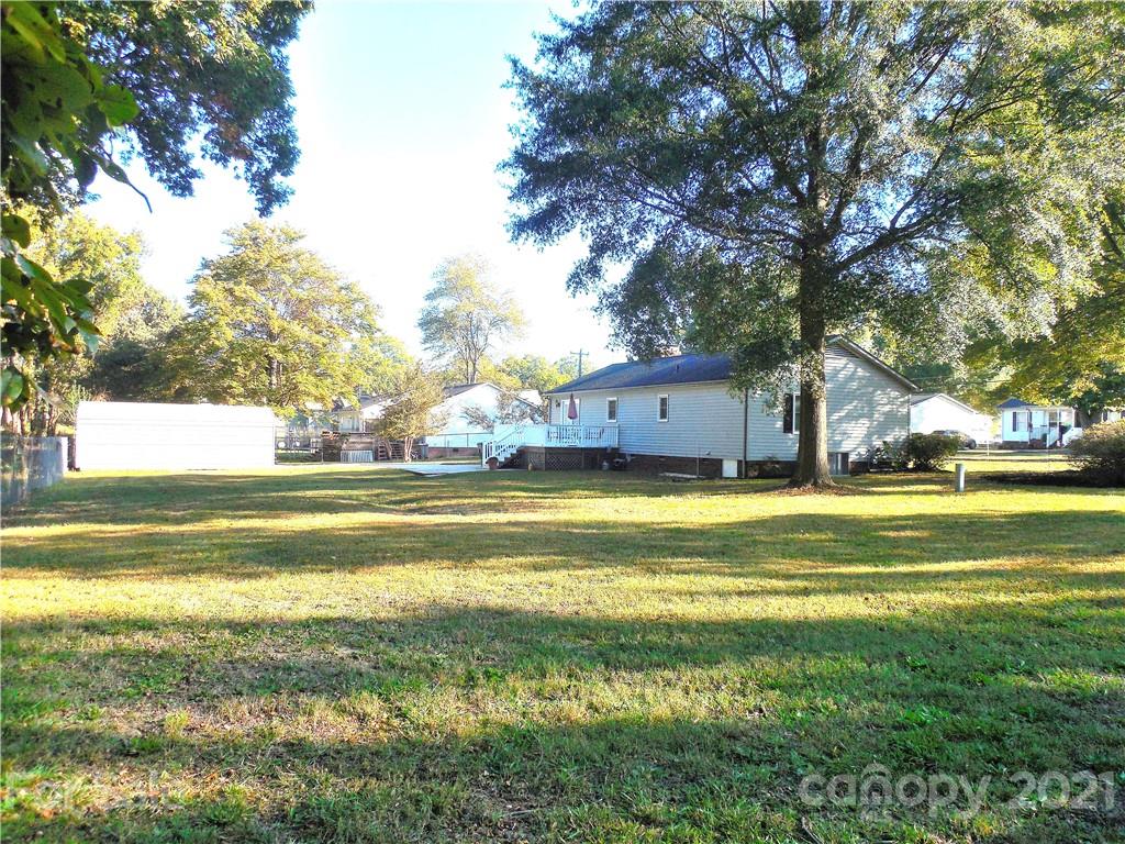 705 Washington Lane Kannapolis, NC 28083 - Photo 29 of 31 a house view with swimming pool in front of it