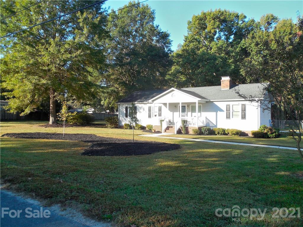 705 Washington Lane Kannapolis, NC 28083 - Photo 30 of 31 a front view of house with yard and green space