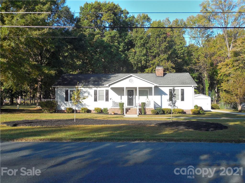 705 Washington Lane Kannapolis, NC 28083 - Photo 31 of 31 a front view of a house with a yard