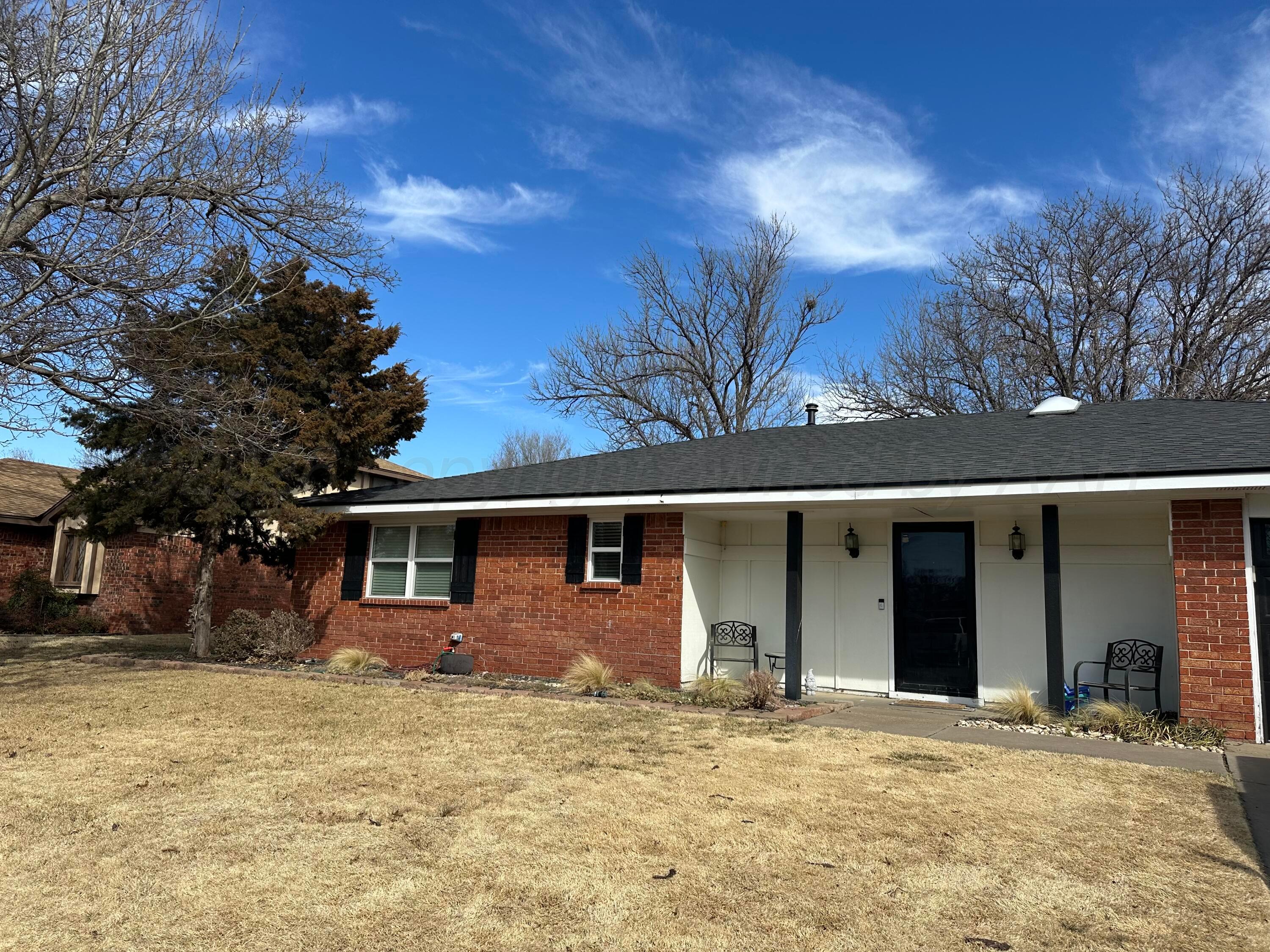 103 Somerset Street Borger, TX 79007 - Photo 2 of 23 front view of a house with a yard