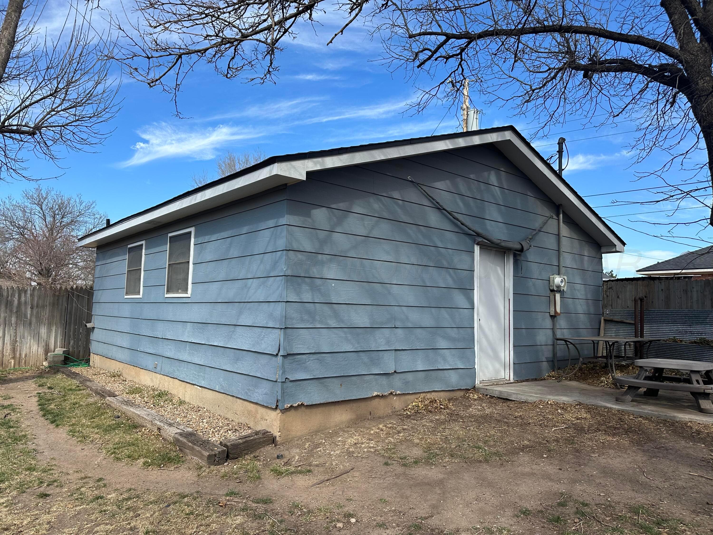 103 Somerset Street Borger, TX 79007 - Photo 22 of 23 a house with a outdoor space