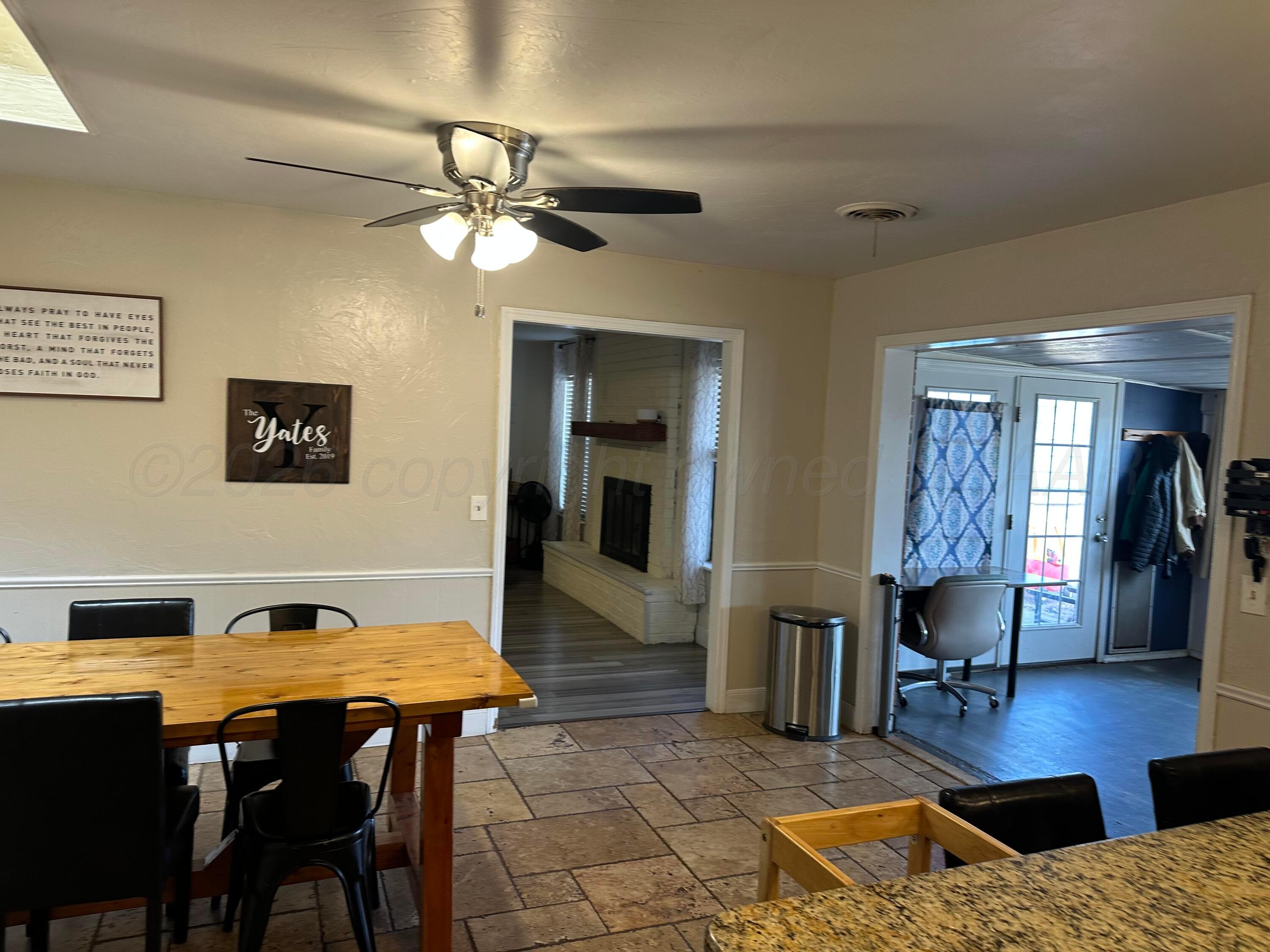 103 Somerset Street Borger, TX 79007 - Photo 10 of 23 a living room with furniture and wooden floor