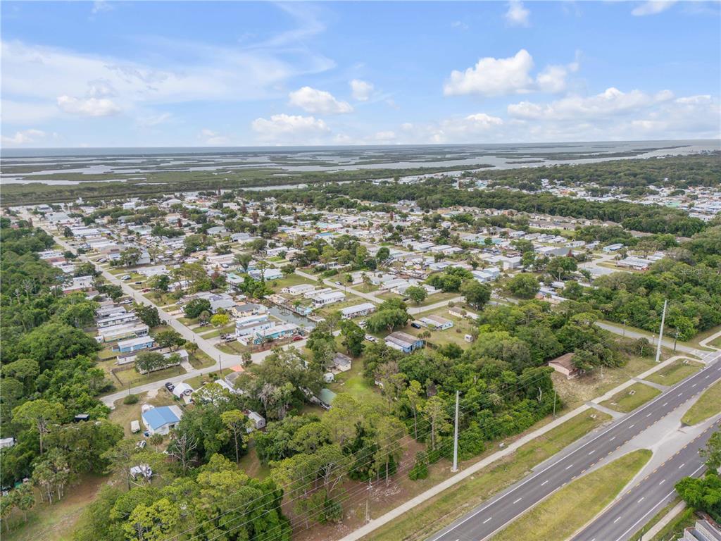 Nellie Street Edgewater, FL 32141 - Photo 14 of 27 an aerial view of residential building and trees
