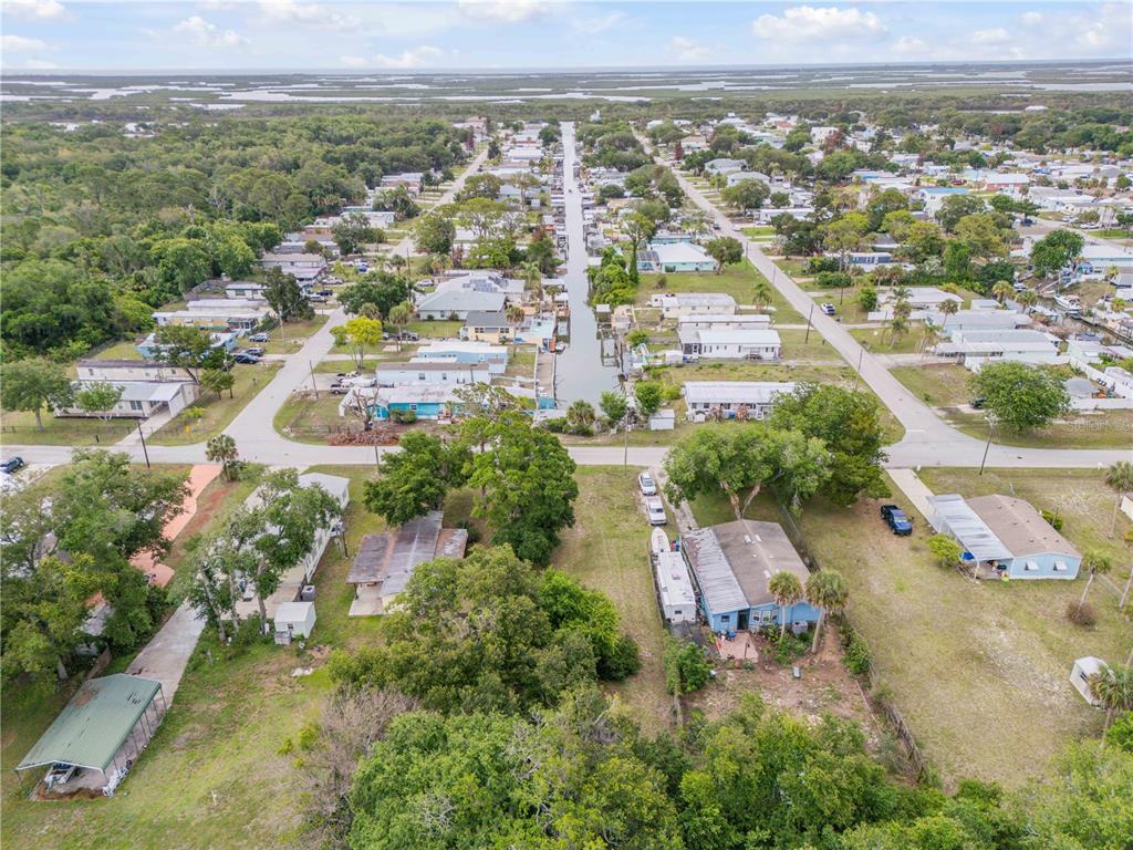 Nellie Street Edgewater, FL 32141 - Photo 21 of 27 an aerial view of residential houses with outdoor space and river