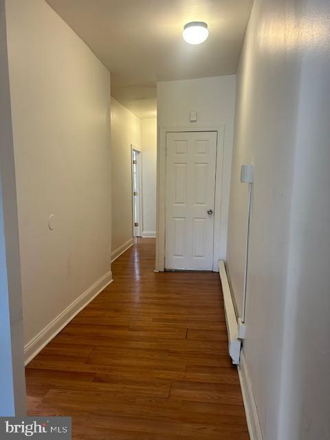513 Brinton Street, Unit 1 Philadelphia, PA 19144 - Photo 5 of 13 a view of a hallway with wooden floor