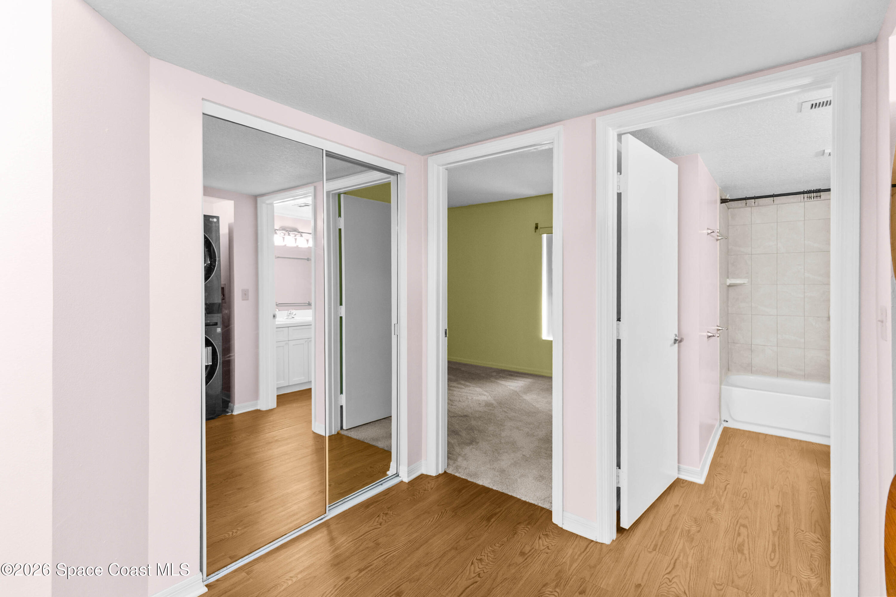 1410 Huntington Lane, Unit 1106 Rockledge, FL 32955 - Photo 11 of 23 a view of a hallway with wooden floor