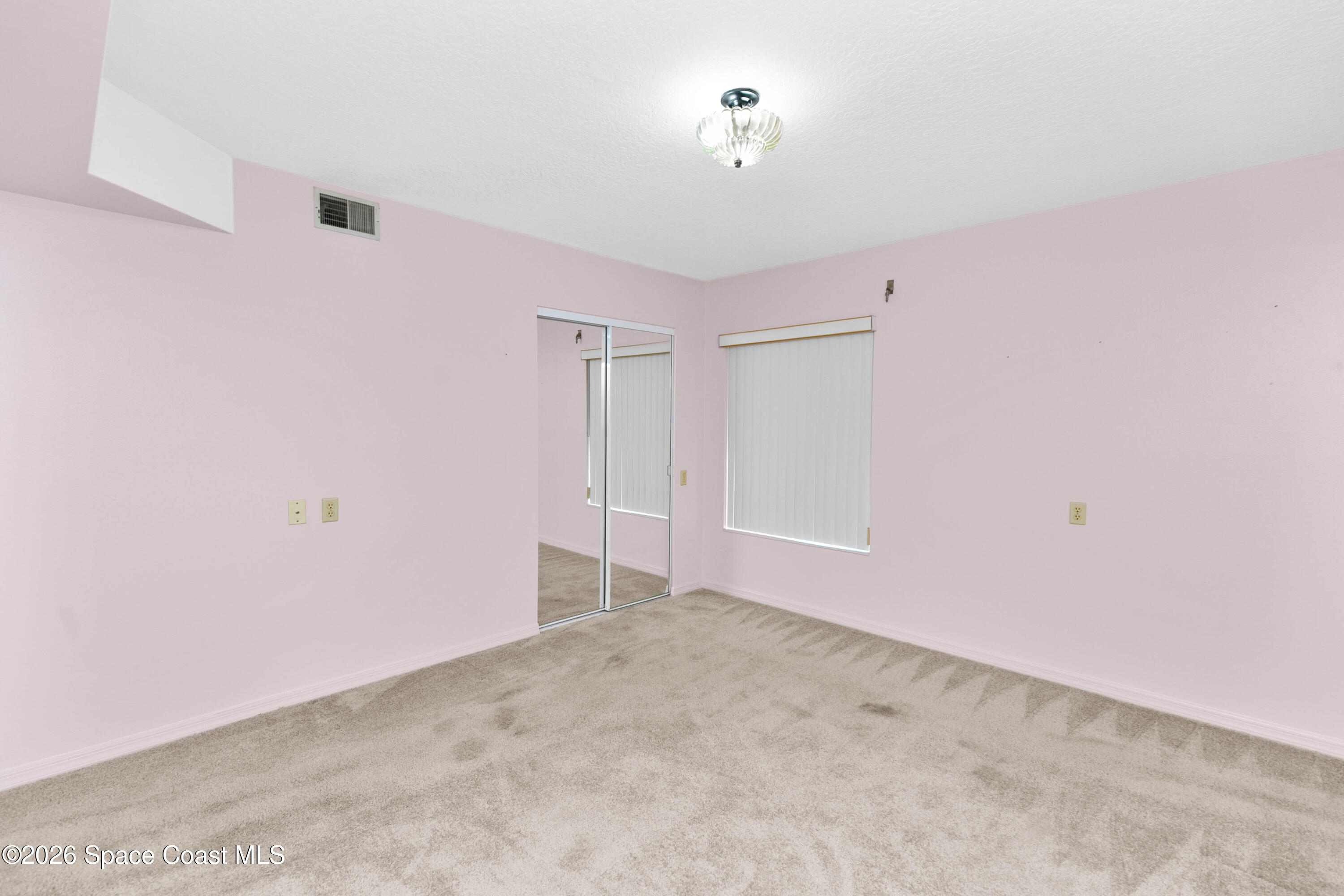 1410 Huntington Lane, Unit 1106 Rockledge, FL 32955 - Photo 14 of 23 a view of an empty room