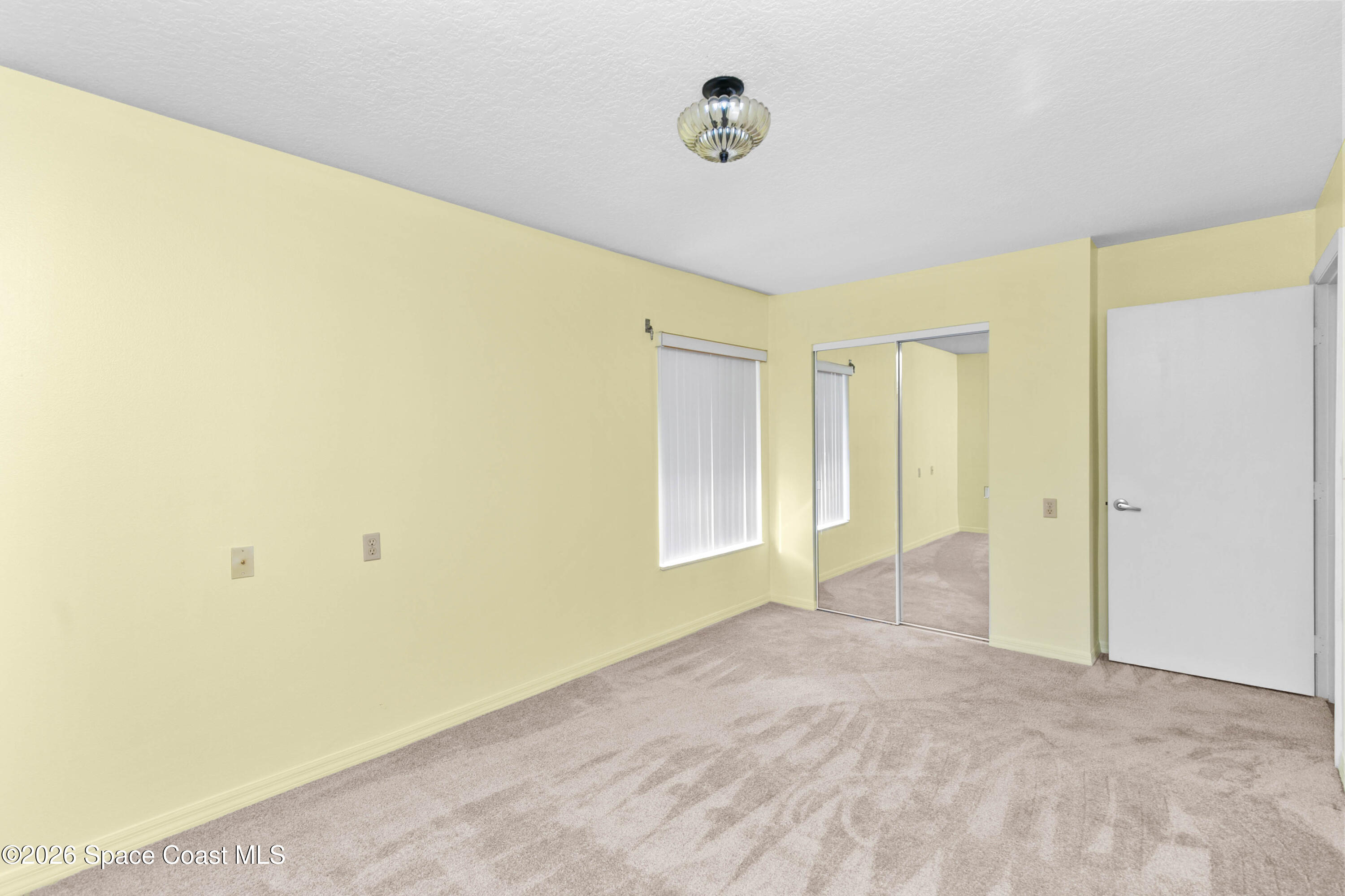 1410 Huntington Lane, Unit 1106 Rockledge, FL 32955 - Photo 16 of 23 a view of an empty room