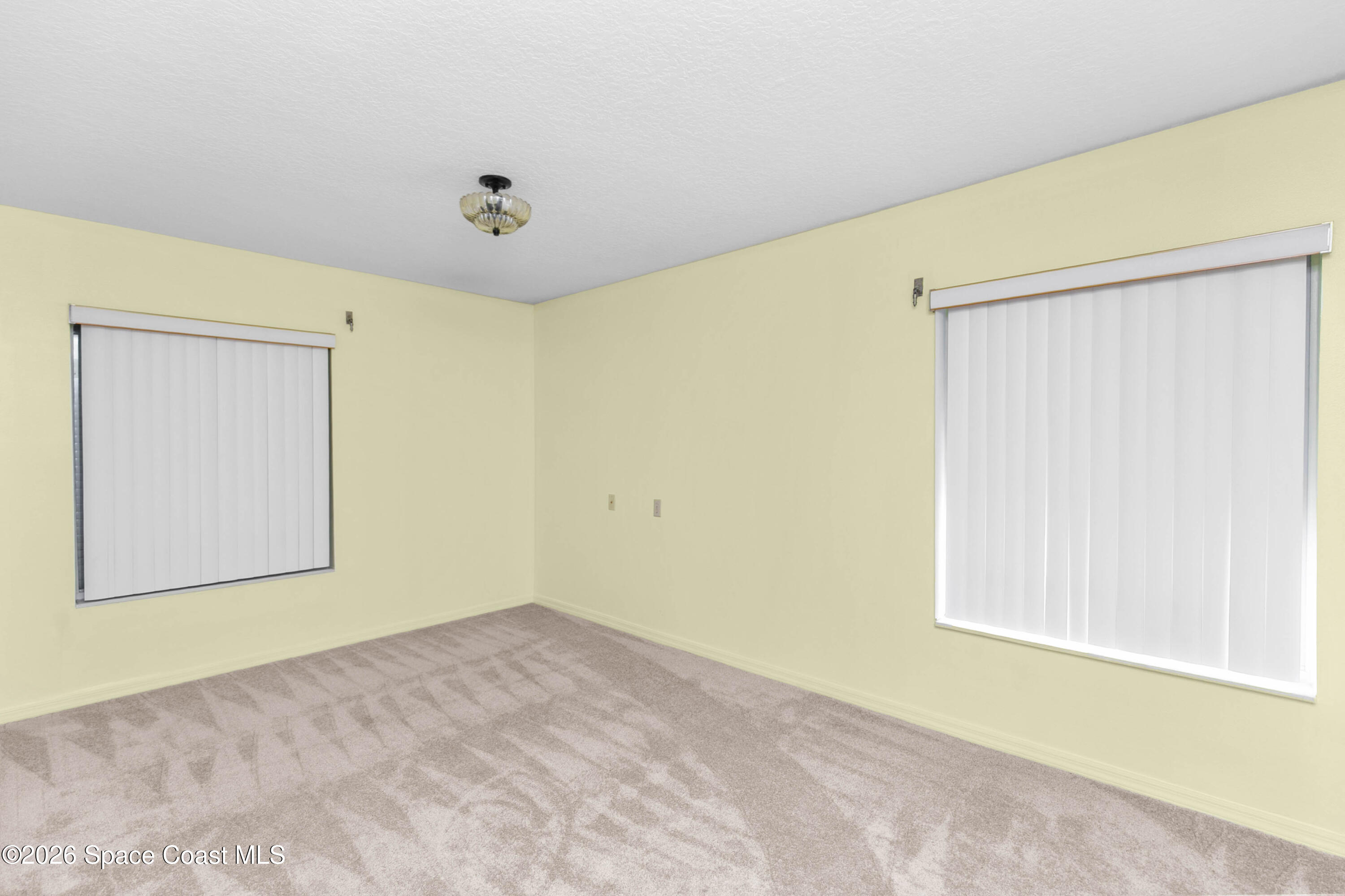 1410 Huntington Lane, Unit 1106 Rockledge, FL 32955 - Photo 17 of 23 a view of a room with a window