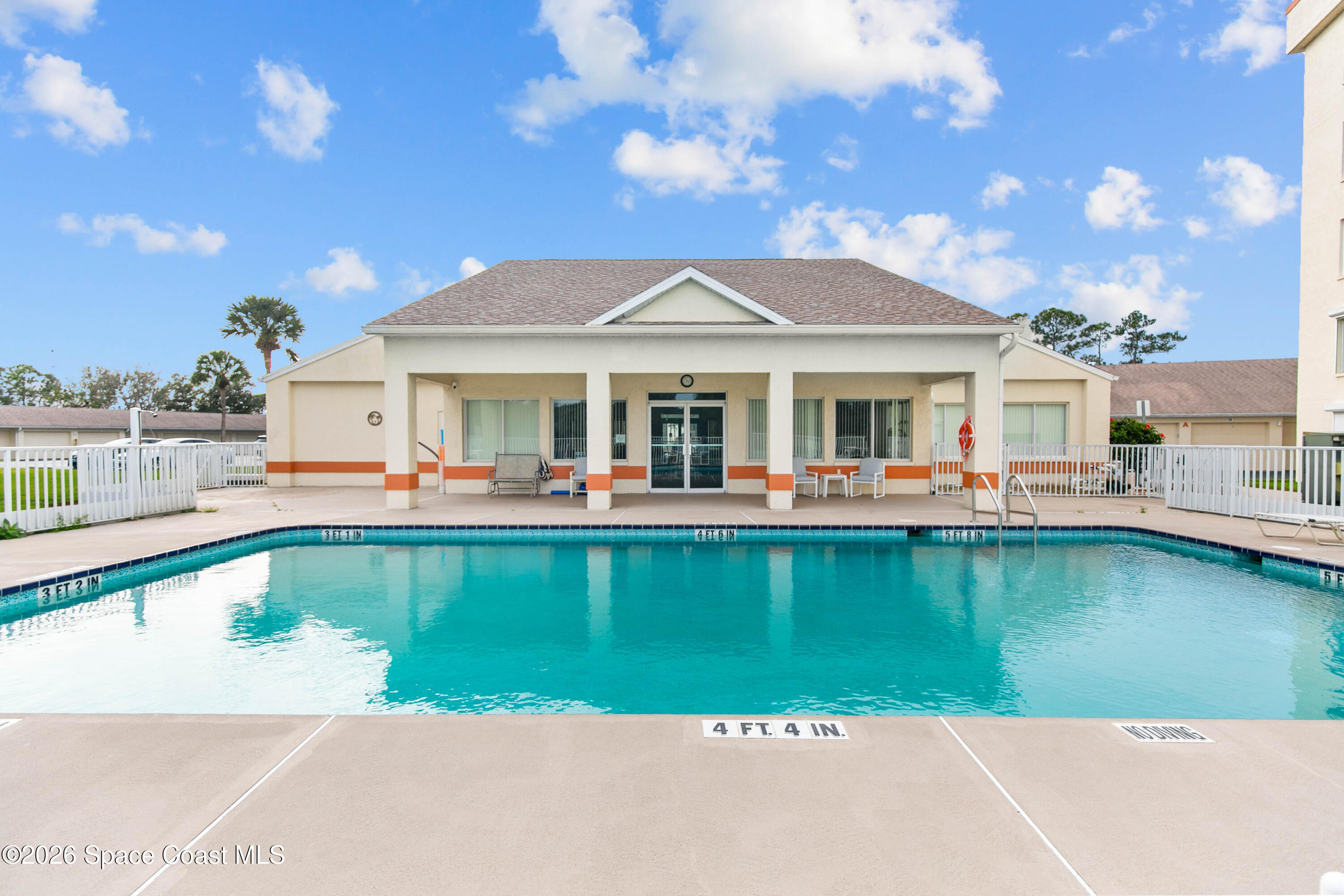 1410 Huntington Lane, Unit 1106 Rockledge, FL 32955 - Photo 20 of 23 a view of a house with a patio