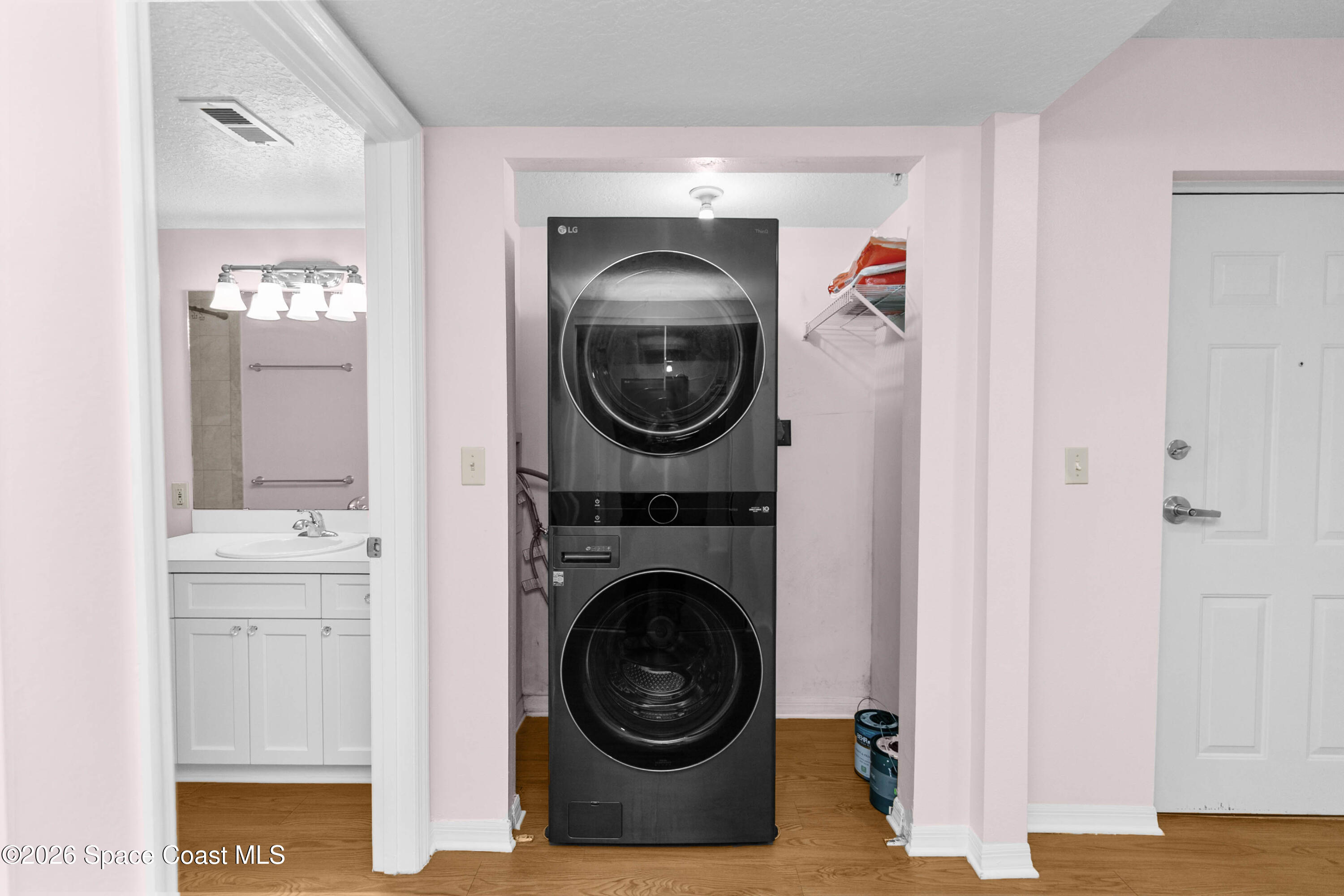 1410 Huntington Lane, Unit 1106 Rockledge, FL 32955 - Photo 10 of 23 a utility room with dryer and washer