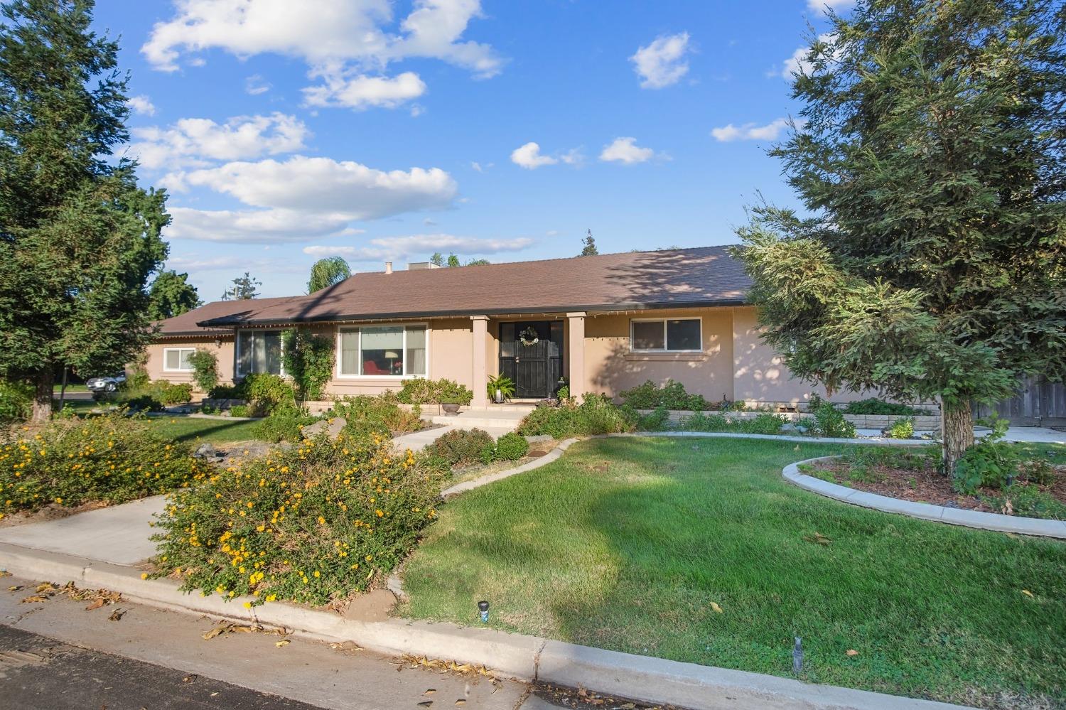17790 South Austin Road Manteca, CA 95336 - Photo 1 of 1 a front view of a house with a yard