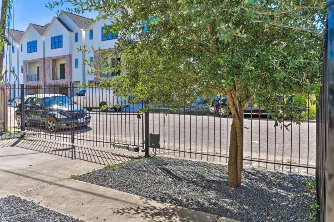 2107 Stuart Street Houston, TX 77004 - Photo 30 of 30 a view of a wrought iron fences in front of a house